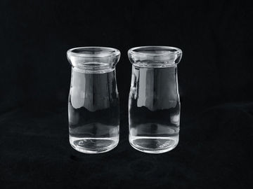 زجاجات المشروبات الزجاجية الشفافة بطباعة شخصية 115 مللي مع غطاء PP